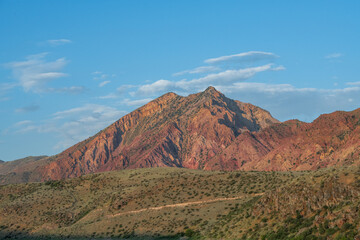 Mountain landscape with blue sky.