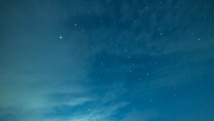 Beautiful night sky background, with long exposure clouds, starry sky




