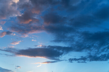 Beautiful orange  sunset sky, with clouds,. Evening sky background.