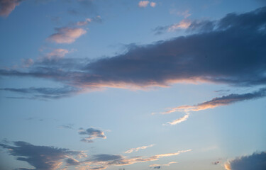 Beautiful orange  sunset sky, with clouds,. Evening sky background.