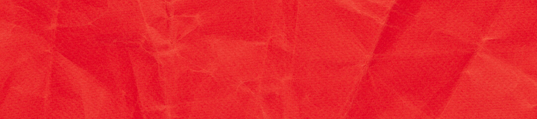 Rich coral red crumpled paper, long web banner, realistic tactile textured background for web design
