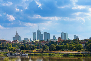Fototapeta premium Cityscape - view of the district of Srodmiescie in the center Warsaw, view from the Vistula River, Poland