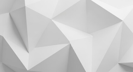 Fototapeta premium A geometric white background features a pattern of folded triangles, creating a modern and abstract texture