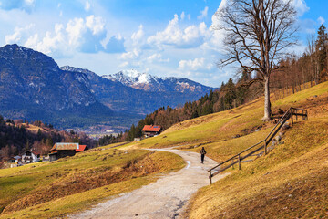 Rural landscape - view of the countryside near in the alpine ski town of Garmisch-Partenkirchen against the background of the Alps, in Upper Bavaria, Germany