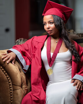 Young African-American Teen Woman Graduation Cap and Gown