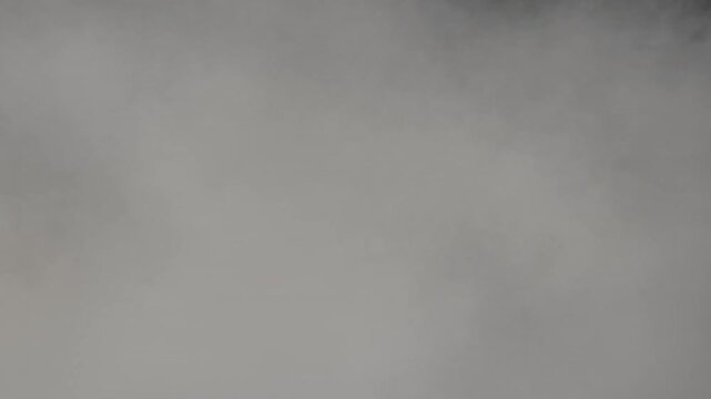 Mist, fog or thin smoke 004 drifting and blowing across the frame, HD 30p, alpha channel for transparent background