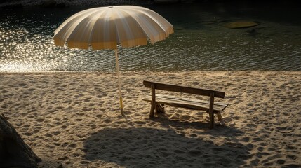 Serene Beach Scene with Umbrella and Simple Wooden Bench at Sunset