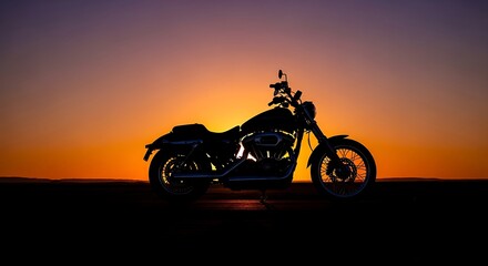 Fototapeta premium Silhouetted motorcycle at sunset, a powerful image of freedom and adventure on the open road.