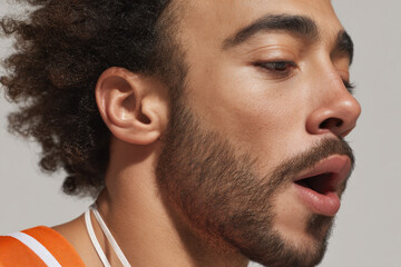 street basketball player with whistle in hand captured in dynamic shot showing random emotion