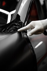 Full Panel Car Vinyl Wrapping. Large-scale vinyl wrap installation transforms the vehicle exterior...