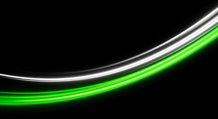 Abstract light painting with green and white neon trails on black background