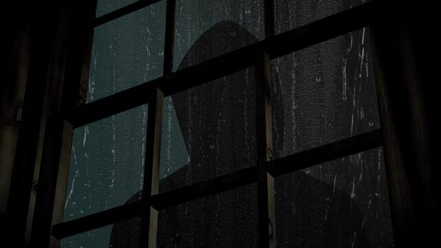 Hooded person looking in window on a rainy night