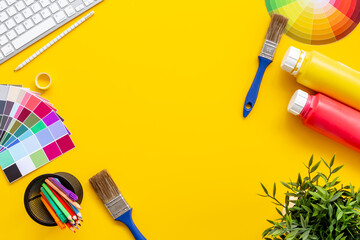 color paint swatches and brushers - decorator or designer tools for work. Top view