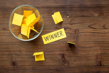Raffle tickets and winner paper with glass jar. Luck and lottery concept