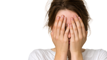 A person expressing emotions with hands covering face, isolated on white background.