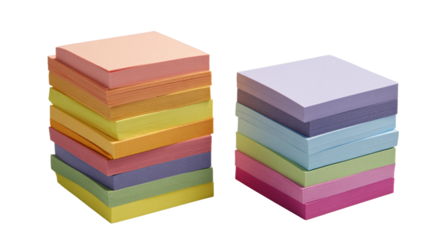 Colorful sticky notes stacked on a white isolated background.