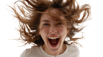 Energetic young woman shouting with joy, hair flying, white isolated background.