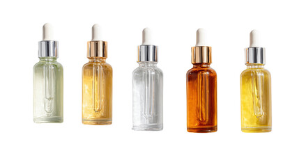 Set of five glass dropper bottles with different colored oils on a white isolated background.