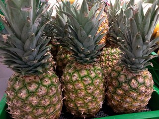 Fresh pineapple sold in the market. Pineapple contains many nutrients that are good for the body.