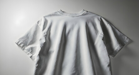 Plain White T Shirt on Light Gray Background Minimalist Casual Clothing