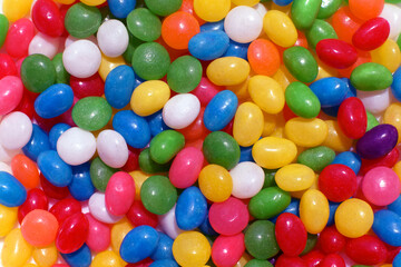 Rainbow background of colorful, bright jelly candies.