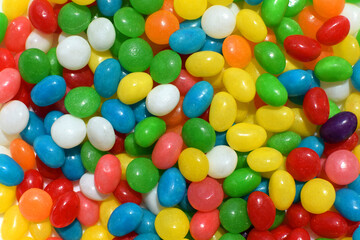 Rainbow background of colorful, bright jelly candies.