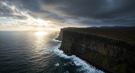 Massive cliff overlooking the ocean during storm