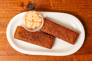 Alcapurria carne on a plate © miss