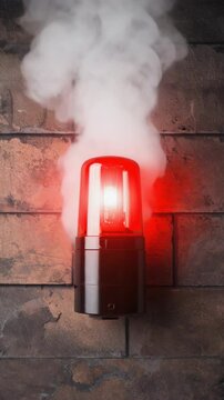 Realistic 3D depiction of a fire alarm&rsquo;s strobe light installed on a brick wall, flashing vivid red pulses while simulated smoke drifts upward in slow motion.