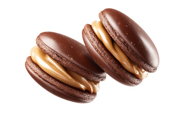 Two chocolate covered cookies with a creamy filling