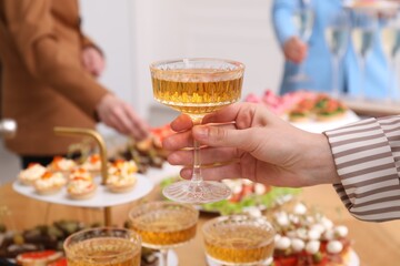 People with different appetizers at buffet, selective focus