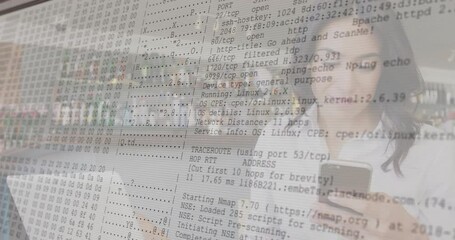 Woman running network scan on laptop in café to audit system with transparent terminal overlay - Powered by Adobe