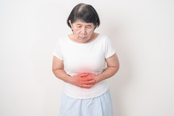 Elderly woman having abdomen aches for Stomach pain, digestion with constipation or Diarrhea from...