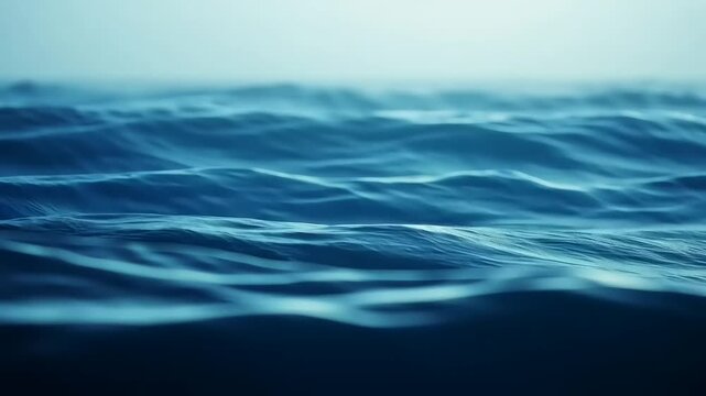 Serene ocean waves under a misty sky, conveying tranquility and depth in a coastal landscape