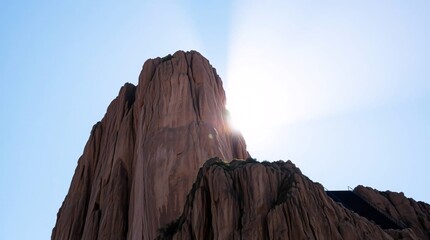 Majestic red rock peak formations pierce the sky natural beauty and the vast desert landscape.