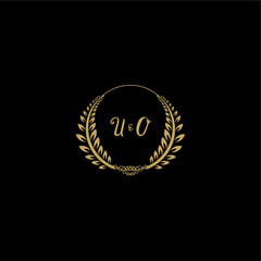 Fototapeta premium UO beautiful feminine and elegant wedding monogram initial logo with circle floral gold