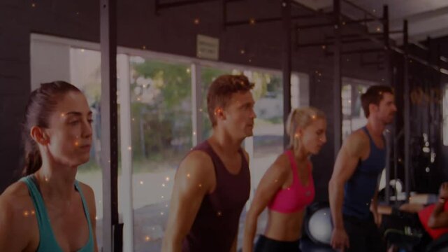 Fitness trainees stepping forward initiating squat for strength while lowering hips against windows