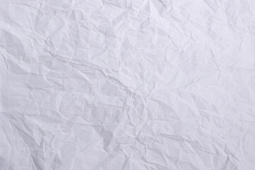 Folded Wrinkled White Paper Texture Background for Vintage and Grunge Design

