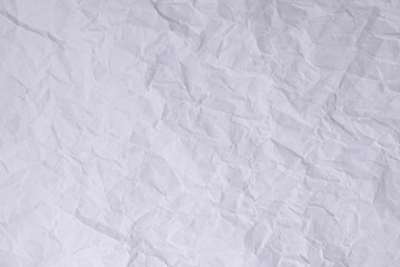Light Wrinkled White Paper Texture with Folded Crease Background

