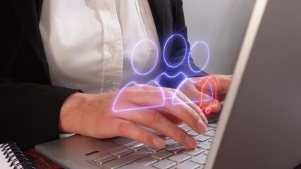 Close-up of woman's hands on computer with holographic icon of group of people with notification bell - Powered by Adobe