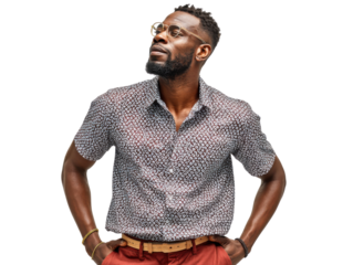 Confident Pose: A stylish man with glasses, hands on his hips, exudes confidence and poise, dressed in a casual shirt and pants against a clean backdrop.