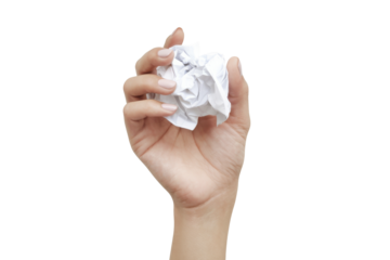 crumpled paper ball in hand on white background
