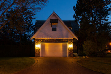 Garage door in luxury house with trees and nice landscape in Spring in Vancouver, Canada, North...