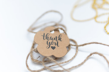 Rustic thank you tag photography with typography for gift wrapping, graphic, brown paper label or...