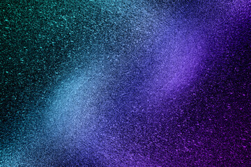 Black dark blue purple orange red shiny glitter abstract background with space. Twinkling glow...
