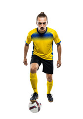 Soccer player balancing ball with foot in yellow and blue shirt on transparent background