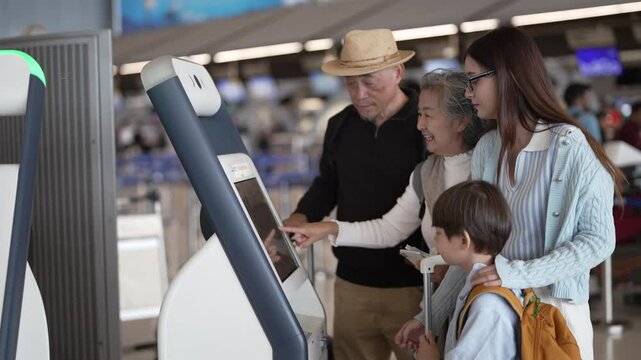 Asian family using airport self check-in kiosk together, multigenerational group interacting with digital screen, modern travel process with child exploring, technology and convenience for travelers