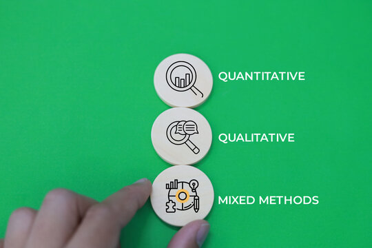 wooden cube with three icons These three research approaches are quantitative, qualitative, and mixed methods