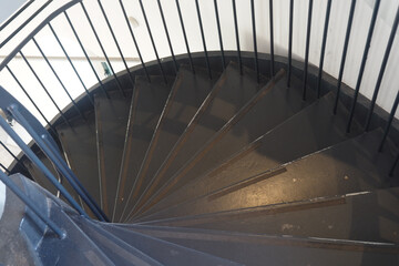 Spiral staircase viewed from above showcases modern design