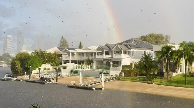 Sunshower and Rainbow Over Gold Coast Canal